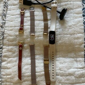 Fitbit Luxe with 4 bands and charger